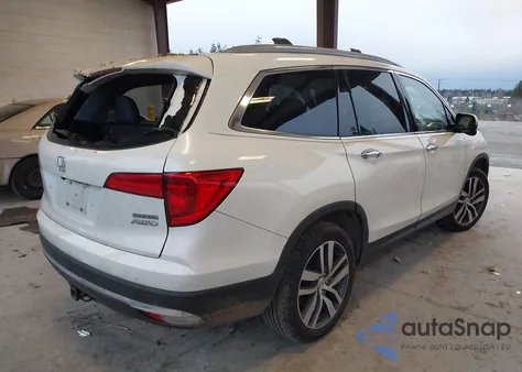 2018 Honda Pilot Touring z USA, uszkodzony, nr VIN 5FNYF6H98JB012052